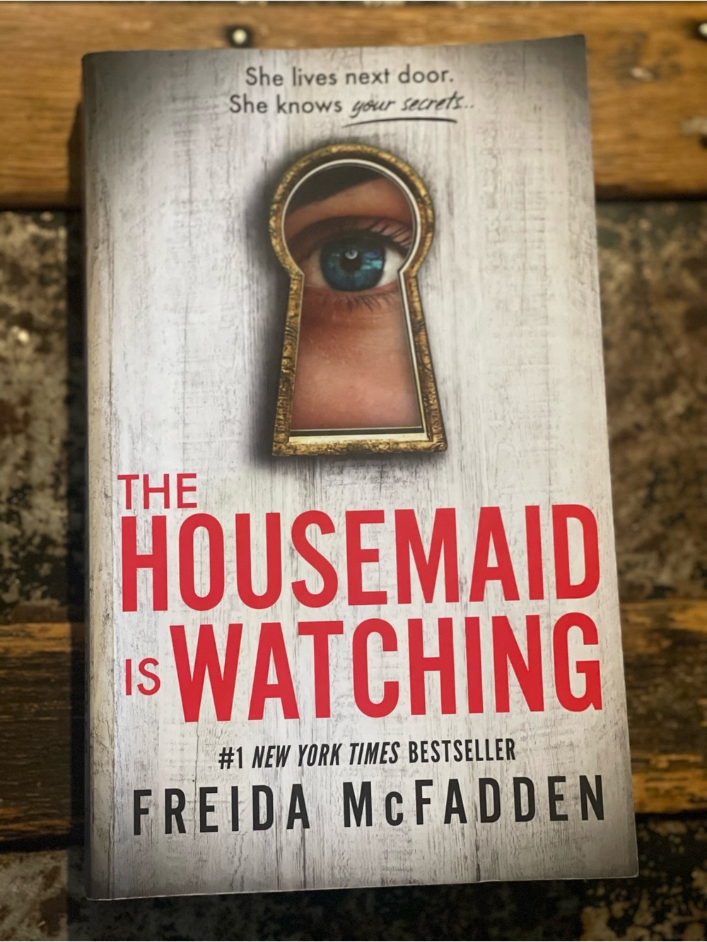The Housemaid Is Watching by - Thriller Paperback, White and Red